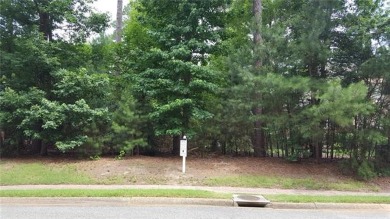Level wooded golf front lot. One of only a few building lots on Two Rivers Country Club in Virginia - for sale on GolfHomes.com, golf home, golf lot