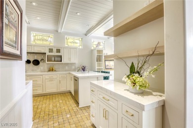 Tucked within the exclusive gates of Canyon Gate, this elegant on Canyon Gate Country Club in Nevada - for sale on GolfHomes.com, golf home, golf lot