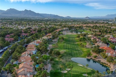 Tucked within the exclusive gates of Canyon Gate, this elegant on Canyon Gate Country Club in Nevada - for sale on GolfHomes.com, golf home, golf lot