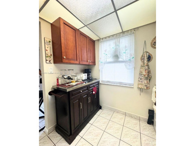 Beautifully maintained 1-bedroom, 1-bathroom condo nestled in a on Oriole Golf and Tennis Club in Florida - for sale on GolfHomes.com, golf home, golf lot