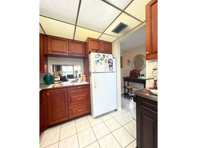 Beautifully maintained 1-bedroom, 1-bathroom condo nestled in a on Oriole Golf and Tennis Club in Florida - for sale on GolfHomes.com, golf home, golf lot