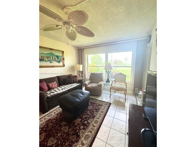 Beautifully maintained 1-bedroom, 1-bathroom condo nestled in a on Oriole Golf and Tennis Club in Florida - for sale on GolfHomes.com, golf home, golf lot