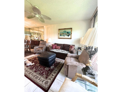 Beautifully maintained 1-bedroom, 1-bathroom condo nestled in a on Oriole Golf and Tennis Club in Florida - for sale on GolfHomes.com, golf home, golf lot