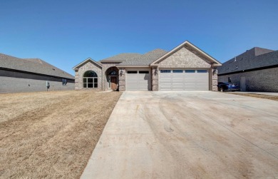 Beautiful ALL BRICK NEW CONSTRUCTION one level home sits on on The Country Club of Arkansas in Arkansas - for sale on GolfHomes.com, golf home, golf lot