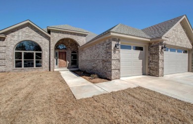 Beautiful ALL BRICK NEW CONSTRUCTION one level home sits on on The Country Club of Arkansas in Arkansas - for sale on GolfHomes.com, golf home, golf lot