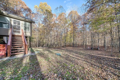 Welcome to Your New Home in Lake Tansi! This charming 2-bedroom on Lake Tansi Village Country Club in Tennessee - for sale on GolfHomes.com, golf home, golf lot