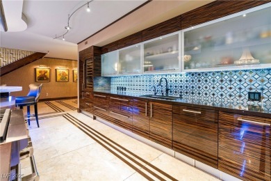 Welcome to the pinnacle of Las Vegas luxury -- a rare two-story on The Wynn Golf Club in Nevada - for sale on GolfHomes.com, golf home, golf lot