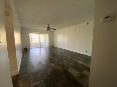 Step into this spacious condo, ideally situated on the 3rd floor on Boca Dunes Golf and Country Club in Florida - for sale on GolfHomes.com, golf home, golf lot