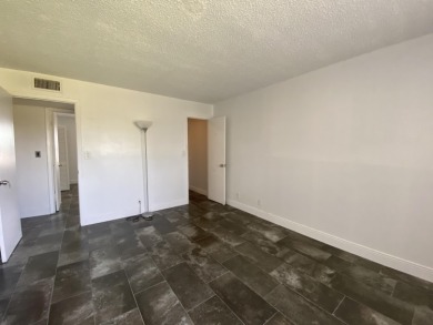 Step into this spacious condo, ideally situated on the 3rd floor on Boca Dunes Golf and Country Club in Florida - for sale on GolfHomes.com, golf home, golf lot