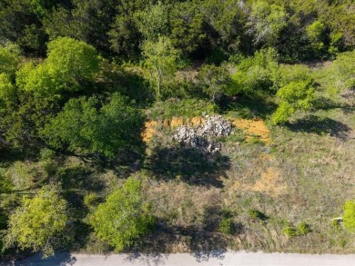Located on the desirable Country Club Road, this rare offering on Lake Whitney Country Club in Texas - for sale on GolfHomes.com, golf home, golf lot