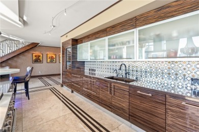 Welcome to the pinnacle of Las Vegas luxury -- a rare two-story on The Wynn Golf Club in Nevada - for sale on GolfHomes.com, golf home, golf lot