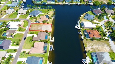 Beautiful Gulf Access Lot with canal intersection view and a on Royal Tee Country Club in Florida - for sale on GolfHomes.com, golf home, golf lot