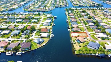 Beautiful Gulf Access Lot with canal intersection view and a on Royal Tee Country Club in Florida - for sale on GolfHomes.com, golf home, golf lot