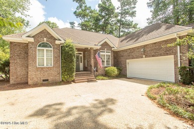 Beautifully maintained custom brick home with steel framed on Ocean Ridge Plantation in North Carolina - for sale on GolfHomes.com, golf home, golf lot