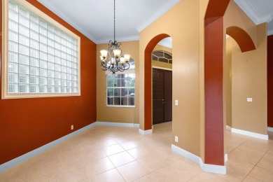 Elegant 4BR/3BA estate home in Osprey Isles, surrounded by on Palm Beach Gardens Golf Course in Florida - for sale on GolfHomes.com, golf home, golf lot