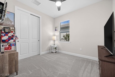 Why wait to build when you can have nearly new? This light and on River Hall Country Club in Florida - for sale on GolfHomes.com, golf home, golf lot