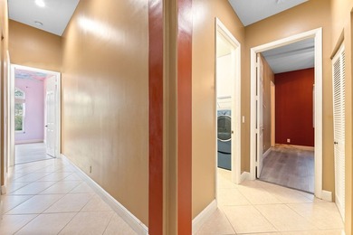 Elegant 4BR/3BA estate home in Osprey Isles, surrounded by on Palm Beach Gardens Golf Course in Florida - for sale on GolfHomes.com, golf home, golf lot