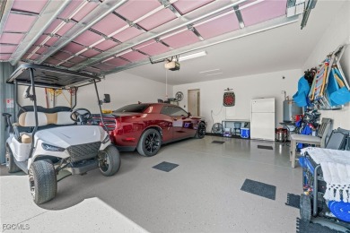Why wait to build when you can have nearly new? This light and on River Hall Country Club in Florida - for sale on GolfHomes.com, golf home, golf lot