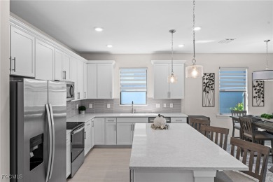 Why wait to build when you can have nearly new? This light and on River Hall Country Club in Florida - for sale on GolfHomes.com, golf home, golf lot