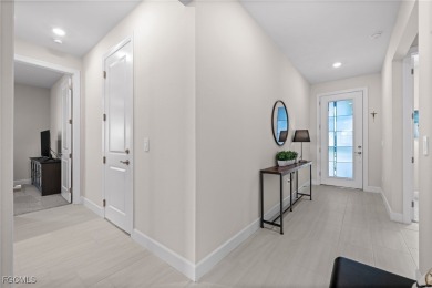 Why wait to build when you can have nearly new? This light and on River Hall Country Club in Florida - for sale on GolfHomes.com, golf home, golf lot