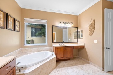 Elegant 4BR/3BA estate home in Osprey Isles, surrounded by on Palm Beach Gardens Golf Course in Florida - for sale on GolfHomes.com, golf home, golf lot