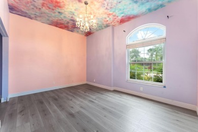 Elegant 4BR/3BA estate home in Osprey Isles, surrounded by on Palm Beach Gardens Golf Course in Florida - for sale on GolfHomes.com, golf home, golf lot