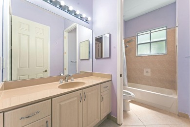 Elegant 4BR/3BA estate home in Osprey Isles, surrounded by on Palm Beach Gardens Golf Course in Florida - for sale on GolfHomes.com, golf home, golf lot
