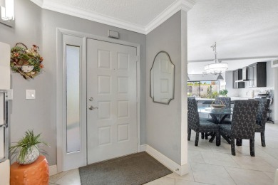 Coveted Renovated lst Floor Corner Condo with Garden and Golf on Gleneagles Golf and Country Club in Florida - for sale on GolfHomes.com, golf home, golf lot