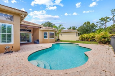 Elegant 4BR/3BA estate home in Osprey Isles, surrounded by on Palm Beach Gardens Golf Course in Florida - for sale on GolfHomes.com, golf home, golf lot