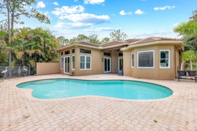 Elegant 4BR/3BA estate home in Osprey Isles, surrounded by on Palm Beach Gardens Golf Course in Florida - for sale on GolfHomes.com, golf home, golf lot
