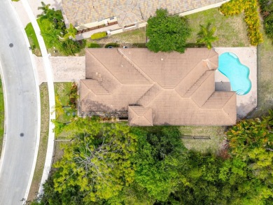 Elegant 4BR/3BA estate home in Osprey Isles, surrounded by on Palm Beach Gardens Golf Course in Florida - for sale on GolfHomes.com, golf home, golf lot