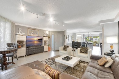 Coveted Renovated lst Floor Corner Condo with Garden and Golf on Gleneagles Golf and Country Club in Florida - for sale on GolfHomes.com, golf home, golf lot