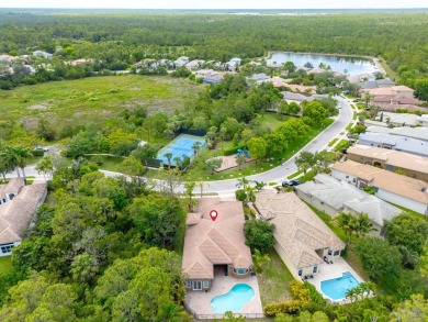 Elegant 4BR/3BA estate home in Osprey Isles, surrounded by on Palm Beach Gardens Golf Course in Florida - for sale on GolfHomes.com, golf home, golf lot