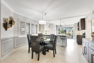 Coveted Renovated lst Floor Corner Condo with Garden and Golf on Gleneagles Golf and Country Club in Florida - for sale on GolfHomes.com, golf home, golf lot