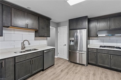 Spacious corner unit located in the Cypress Point Golf Club on Cypress Point Country Club in Virginia - for sale on GolfHomes.com, golf home, golf lot