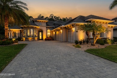 Welcome to this exquisite 5-bedroom, 4-bath luxury estate with a on Plantation Bay Golf and Country Club in Florida - for sale on GolfHomes.com, golf home, golf lot