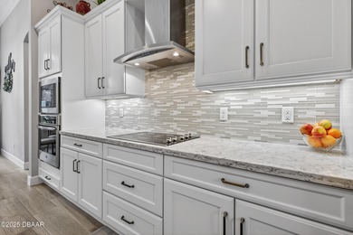 Welcome to this exquisite 5-bedroom, 4-bath luxury estate with a on Plantation Bay Golf and Country Club in Florida - for sale on GolfHomes.com, golf home, golf lot