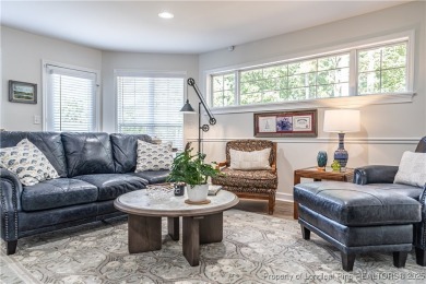 This meticulously maintained golf-front brick ranch nestled in on Beacon Ridge Golf and Country Club in North Carolina - for sale on GolfHomes.com, golf home, golf lot