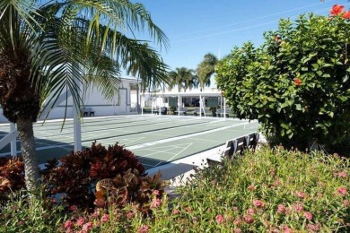 Imagine docking your 35 foot Boat behind your home. This on Windstar on Naples Bay in Florida - for sale on GolfHomes.com, golf home, golf lot