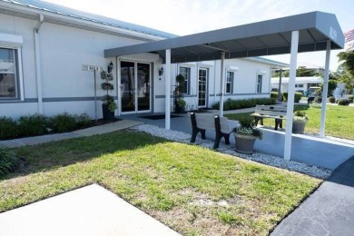 Imagine docking your 35 foot Boat behind your home. This on Windstar on Naples Bay in Florida - for sale on GolfHomes.com, golf home, golf lot