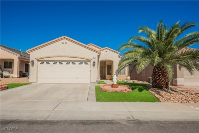 This popular Palm Desert model is move-in ready and filled with on Desert Willow Golf Course in Nevada - for sale on GolfHomes.com, golf home, golf lot