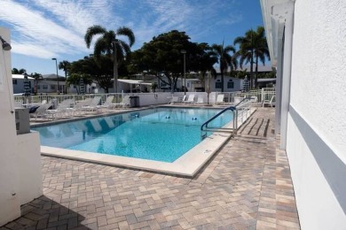 Imagine docking your 35 foot Boat behind your home. This on Windstar on Naples Bay in Florida - for sale on GolfHomes.com, golf home, golf lot