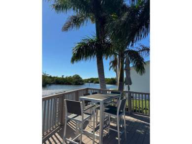 Imagine docking your 35 foot Boat behind your home. This on Windstar on Naples Bay in Florida - for sale on GolfHomes.com, golf home, golf lot