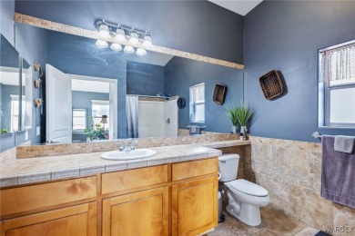 Explore this semi-custom home in the Valle Vista community on Valle Vista Golf Course in Arizona - for sale on GolfHomes.com, golf home, golf lot