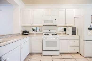 This popular Palm Desert model is move-in ready and filled with on Desert Willow Golf Course in Nevada - for sale on GolfHomes.com, golf home, golf lot
