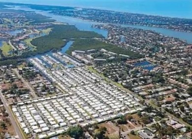 Imagine docking your 35 foot Boat behind your home. This on Windstar on Naples Bay in Florida - for sale on GolfHomes.com, golf home, golf lot