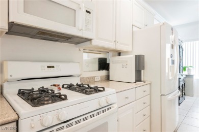 This popular Palm Desert model is move-in ready and filled with on Desert Willow Golf Course in Nevada - for sale on GolfHomes.com, golf home, golf lot