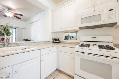 This popular Palm Desert model is move-in ready and filled with on Desert Willow Golf Course in Nevada - for sale on GolfHomes.com, golf home, golf lot