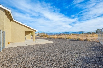 Explore this semi-custom home in the Valle Vista community on Valle Vista Golf Course in Arizona - for sale on GolfHomes.com, golf home, golf lot