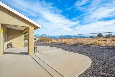 Explore this semi-custom home in the Valle Vista community on Valle Vista Golf Course in Arizona - for sale on GolfHomes.com, golf home, golf lot